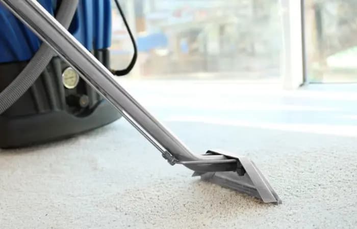 Domestic carpet cleaning in a living room