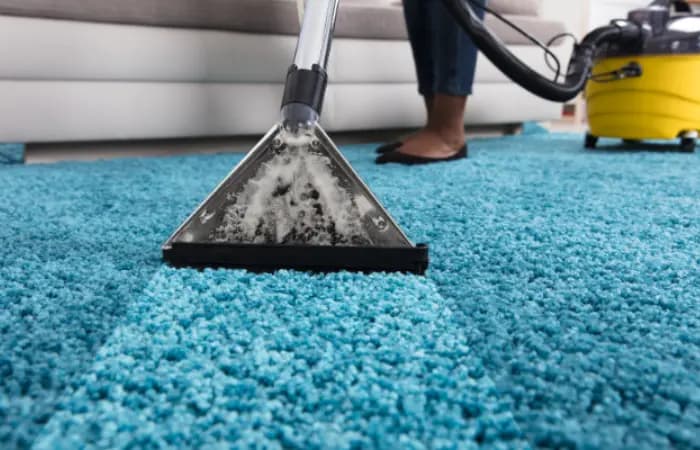 Upholstery cleaning on a fabric sofa